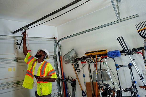Professional Garage Door Panel Replacement technician working in Salina, KS